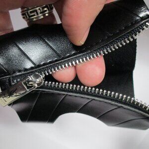 YSL Black opium Jacket for bottles Yes a jacket for your perfume bottle! Zipper